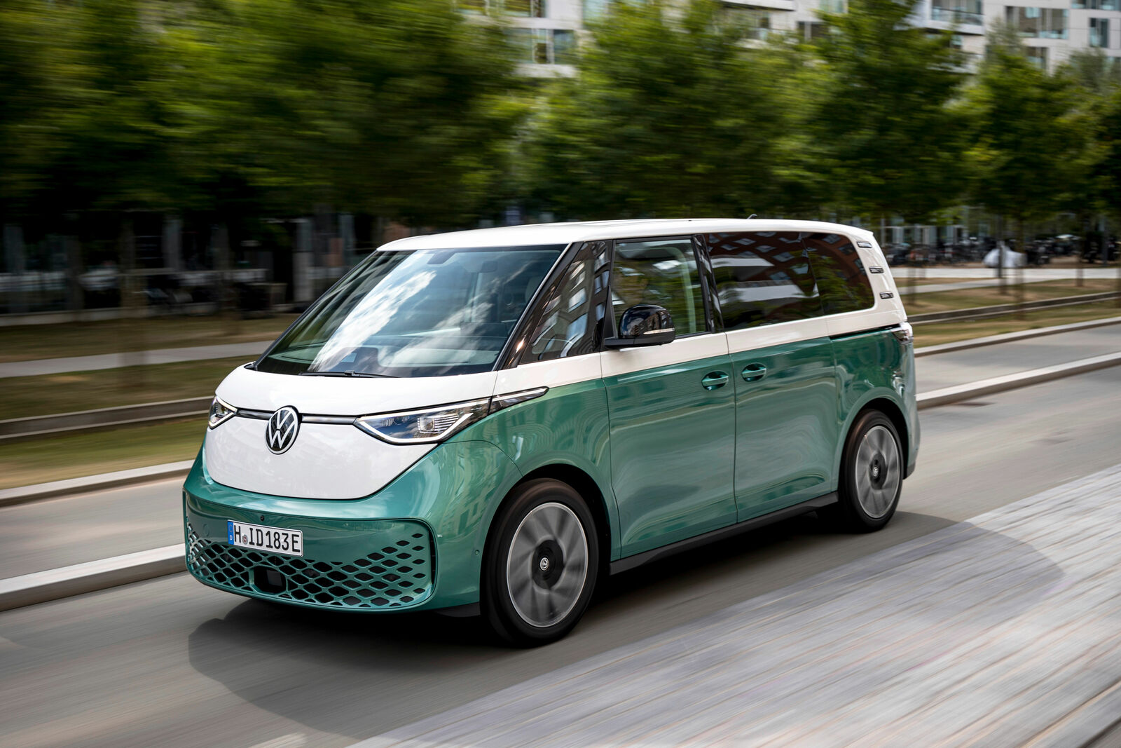 Volkswagen ID. Buzz electric people mover driving on a city street
